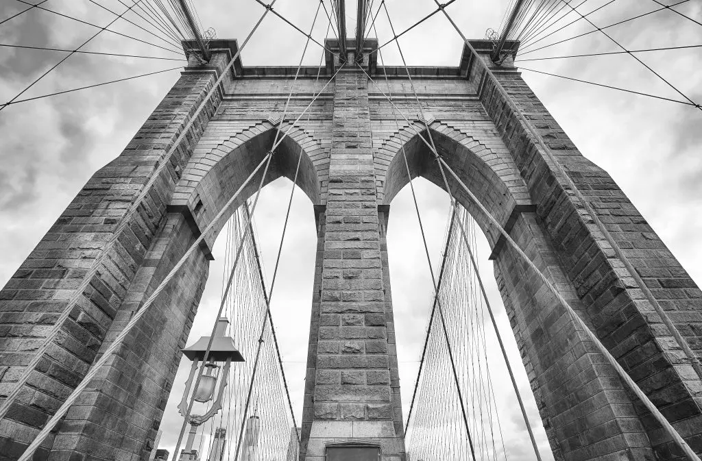 Looking up at the Brooklyn Bridge, New York City.