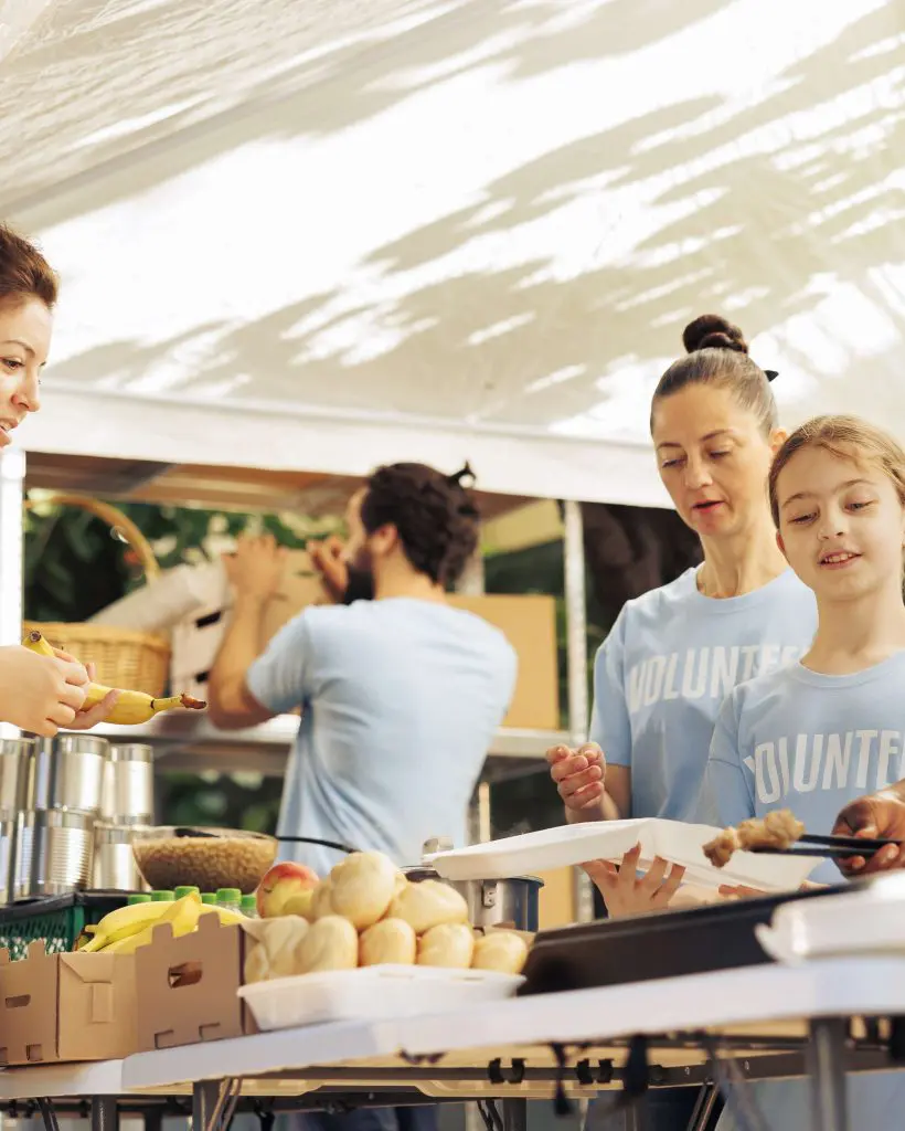 Non-profit workers give food donations